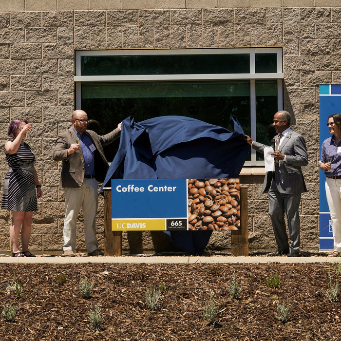 UC Davis College of Engineering Dean, UC Davis Chancellor, Professors Ristenpart, Batali and Kuhl, unveil the coffee center's new sign