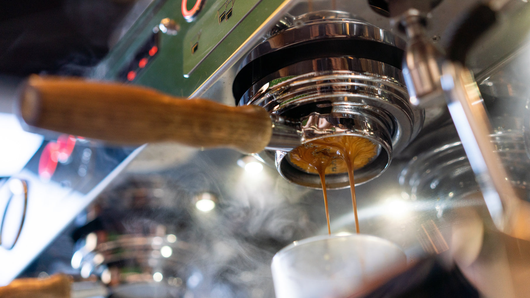 espresso machine brewing coffee