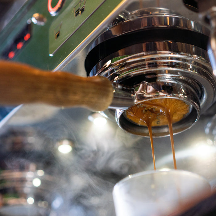 espresso machine brewing coffee