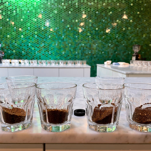 cupping coffee at the crown