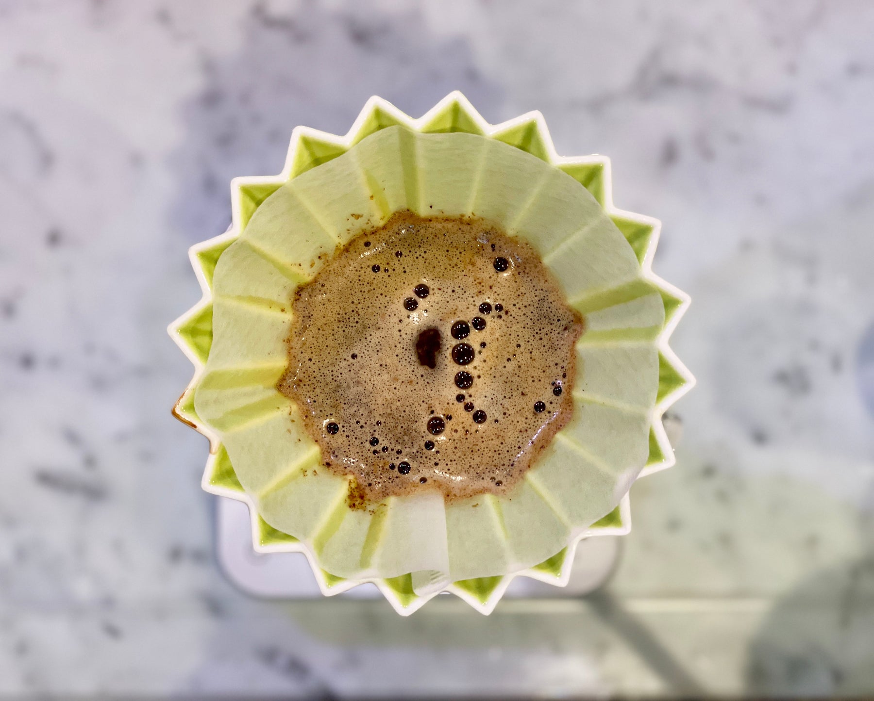 brewing coffee using origami brewer