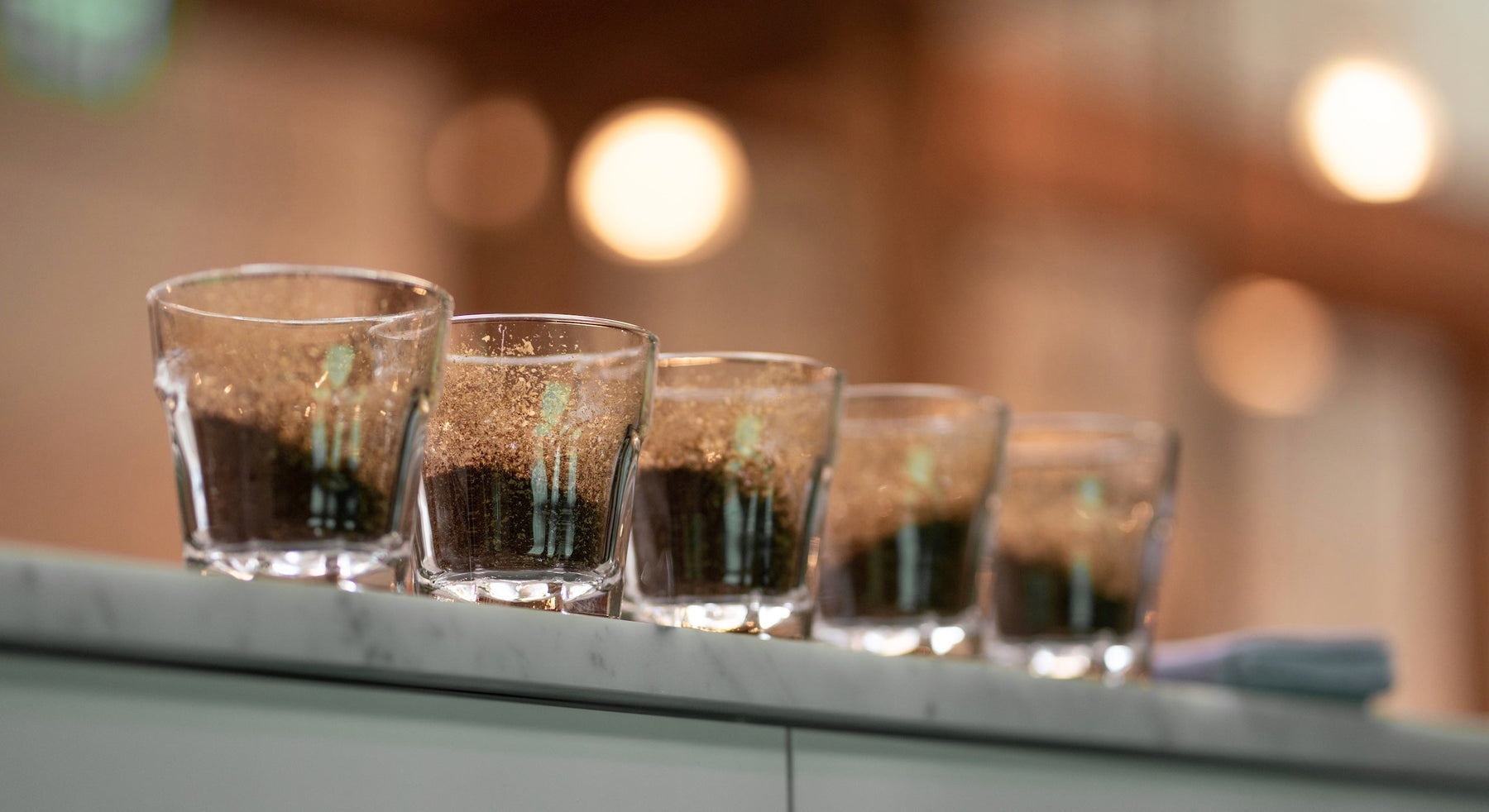 5 ground coffees in a gibraltar glass