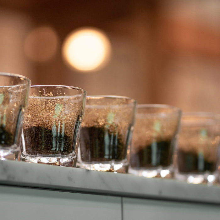 5 ground coffees in a gibraltar glass