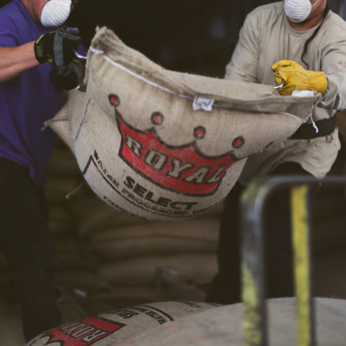 Specialty green coffee being unloaded at the Royal Coffee Warehouse