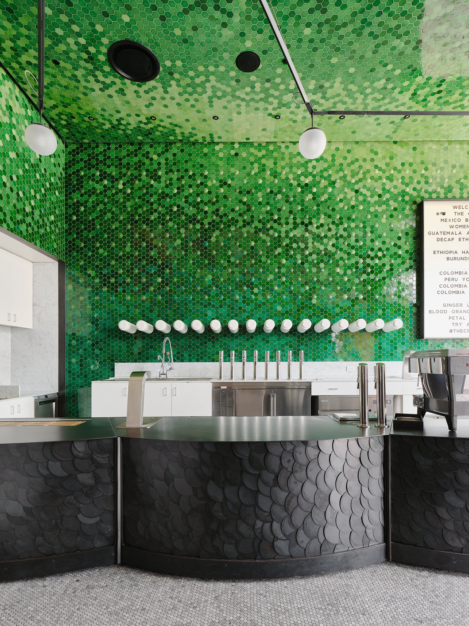 The Crown Tasting Room with green mosaic tile wall